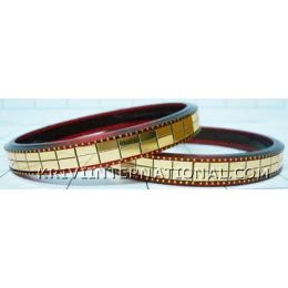 KKLK01029 A pair of acrylic bangles/bracelete with golden bricks handiwork.
